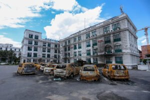 Burned-out Vehicles And Vandalized Buildings Are Seen At The Premises Of Singha Durbar