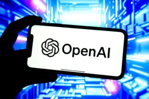 In this photo illustration, an OpenAI logo is seen displayed