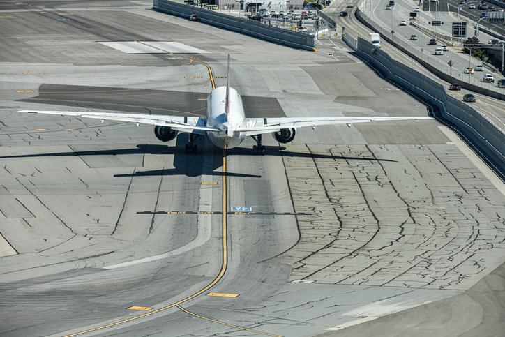 airplane leaving overnight parking area