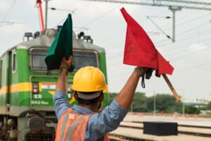 Signal Man Guiding Train on Indian Railways