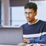 laptop-using-man-1-1