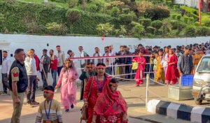 Devotees stand in queue to register themselves for the pilgrimage to the holy shrine of Mata Vaishno Devi temple