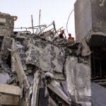 A residential building in Be'er Sheva destroyed by an