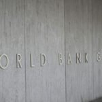 Poster hung reading "End Racism" in the World Bank building